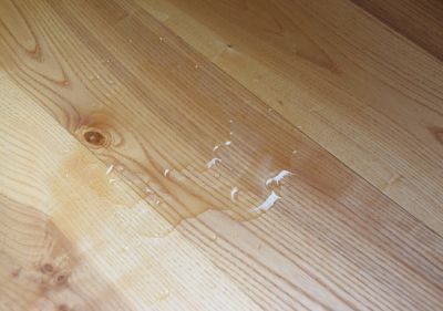10 Tips For Maintaining Unfinished Wood Flooring Water Spill On Light Brown Floor